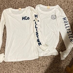 Two Hollister Women’s 90’s White and Navy Long Sleeve Tees